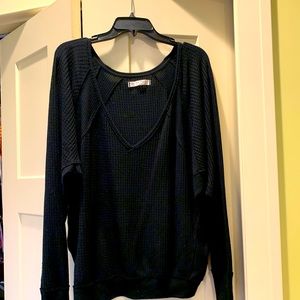 Stylish oversized black sweater by We the Free.